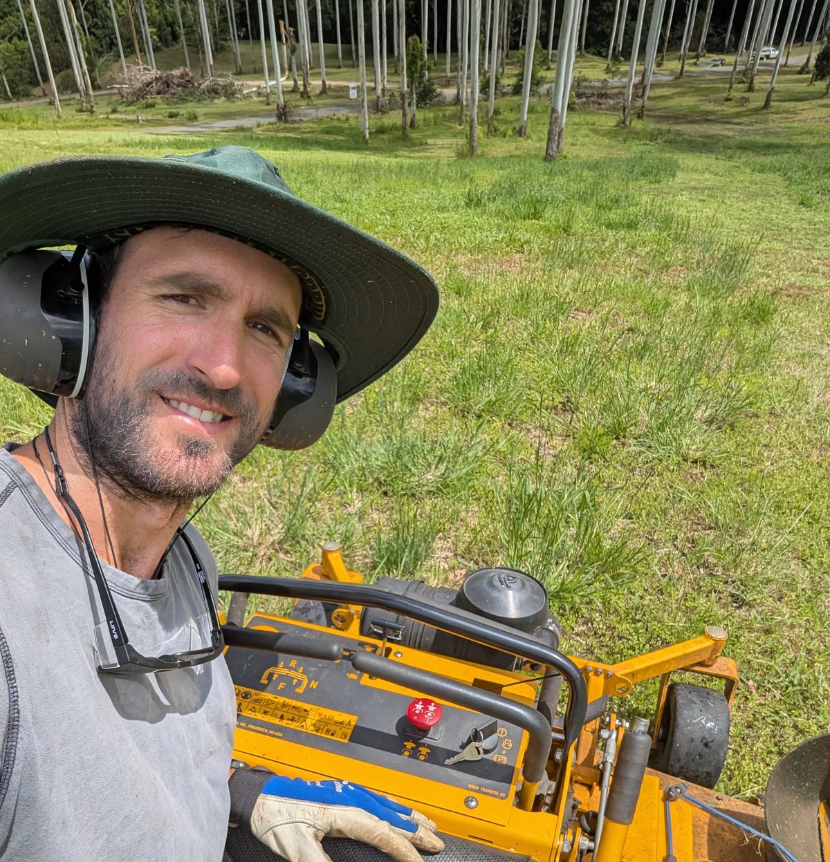 Ben Bonifant, founder of AutoAcre, on a zero-turn ride-on mower at a Northern Rivers acreage property